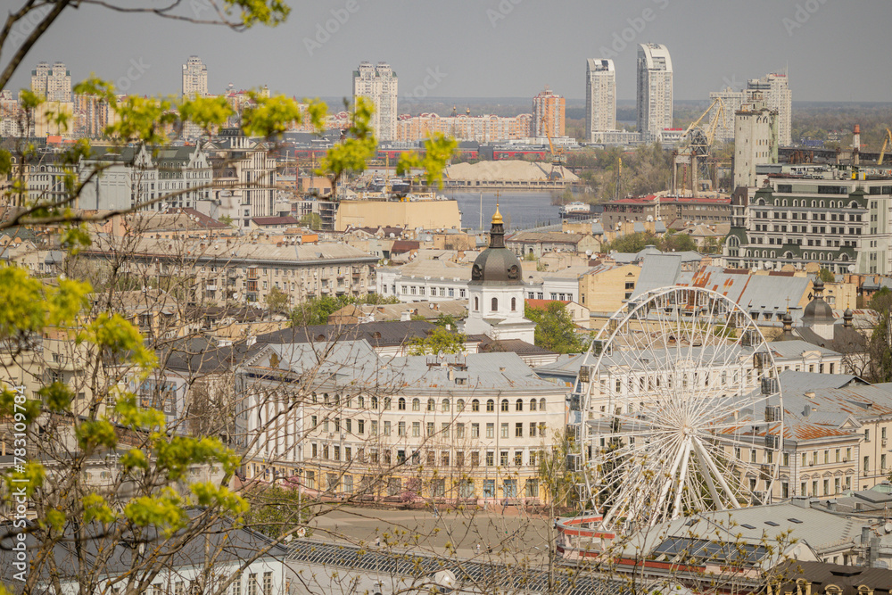 Kyiv, Ukraine. April 11, 2024. A warm sunny day. Everything blossomed. incredible view of Podil. The historical district of Podil, Vozdvizhenka and St. Andrew's Church. 
