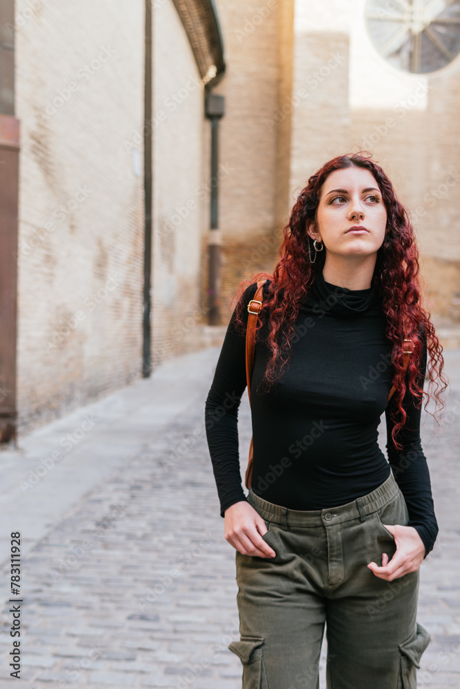 Traveler on a sightseeing tour of the old town of Zaragoza Traveler on a sightseeing tour of the old town of Zaragoza