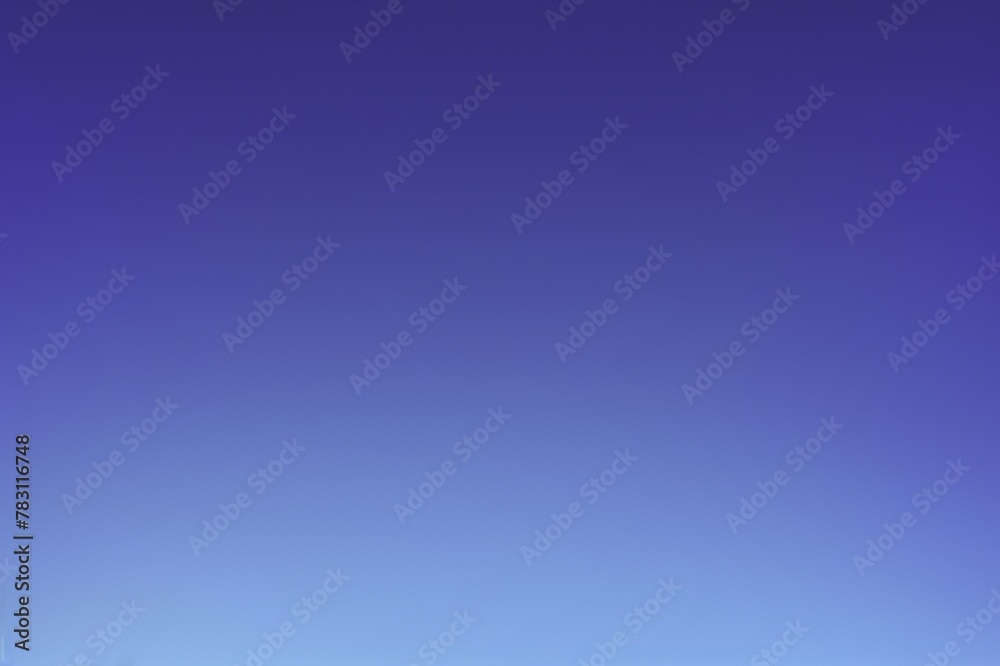 Obraz premium Serene Gradient Blue Sky Background, Light to Dark, Elegant Atmosphere for Text, High-Resolution Detail