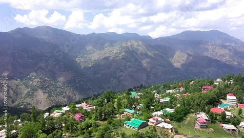 Muree village, Islamabad with residential local houses, nature trees, Pakistan in urban city town in Asia, buildings. Aerial top view  photo