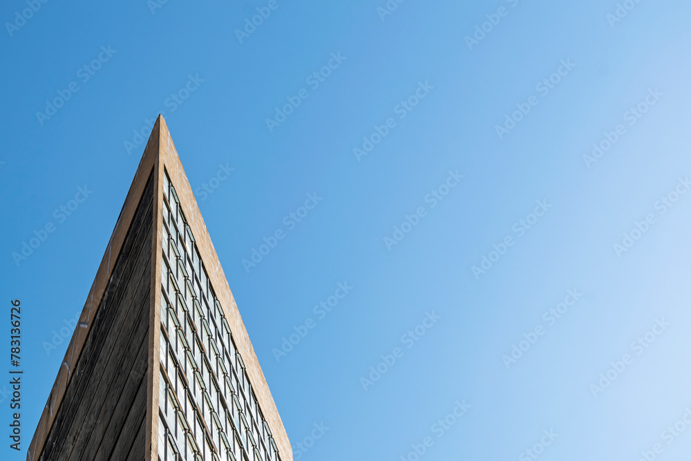 Building detail on cloudless blue sky background. Horizontal. Advertising space. Building detail on cloudless blue sky background. Horizontal. Advertising space.