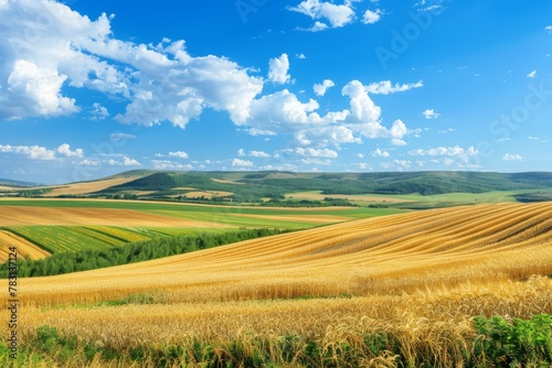 Tranquil and picturesque rural landscape with lush green fields and a clear blue sky