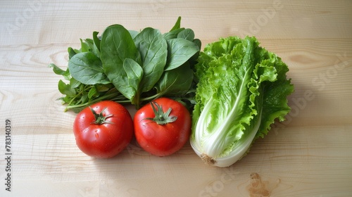 Fresh vegetables isolated on wooden background.