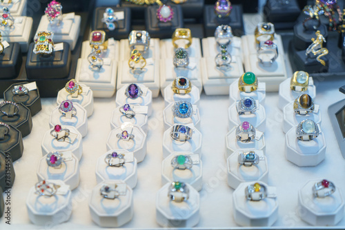 Glittering Diamond Rings on Display in High-End Jewelry Store © ake1150