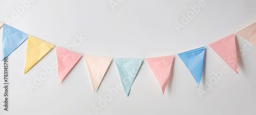 Paper party flags for decoration and covering on white background