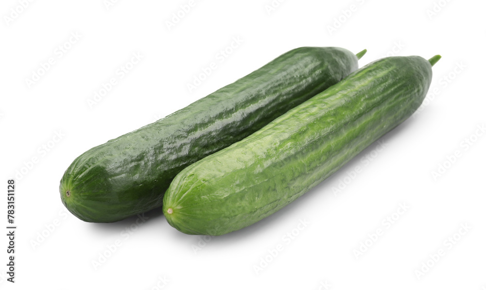 Two long fresh cucumbers isolated on white Two long fresh cucumbers isolated on white