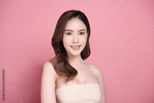 Beautiful young asian woman with clean fresh skin on pink background, Face care, Facial treatment, Cosmetology, beauty and spa, Asian women portrait.