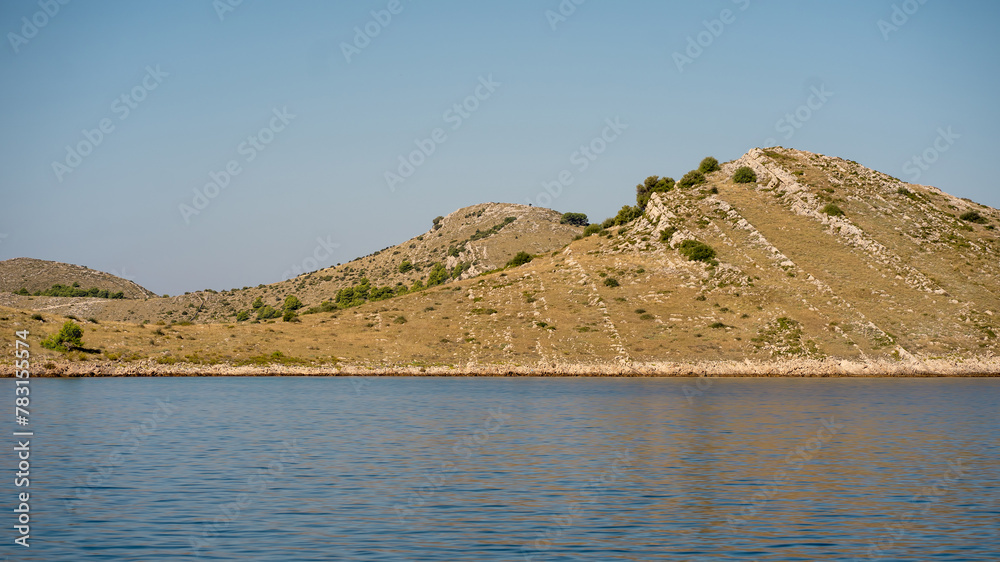 Sunny scene with picturesque dry hills in Dugi Otok island, Adriatic Sea, Croatia Sunny scene with picturesque dry hills in Dugi Otok island, Adriatic Sea, Croatia