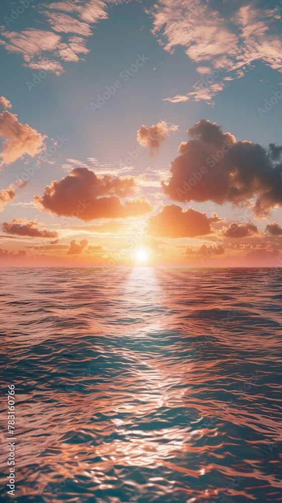 Obraz premium The sun is dipping below the horizon, casting a warm glow over the ocean. The sky is painted in shades of orange and pink, reflecting off the calm waters.