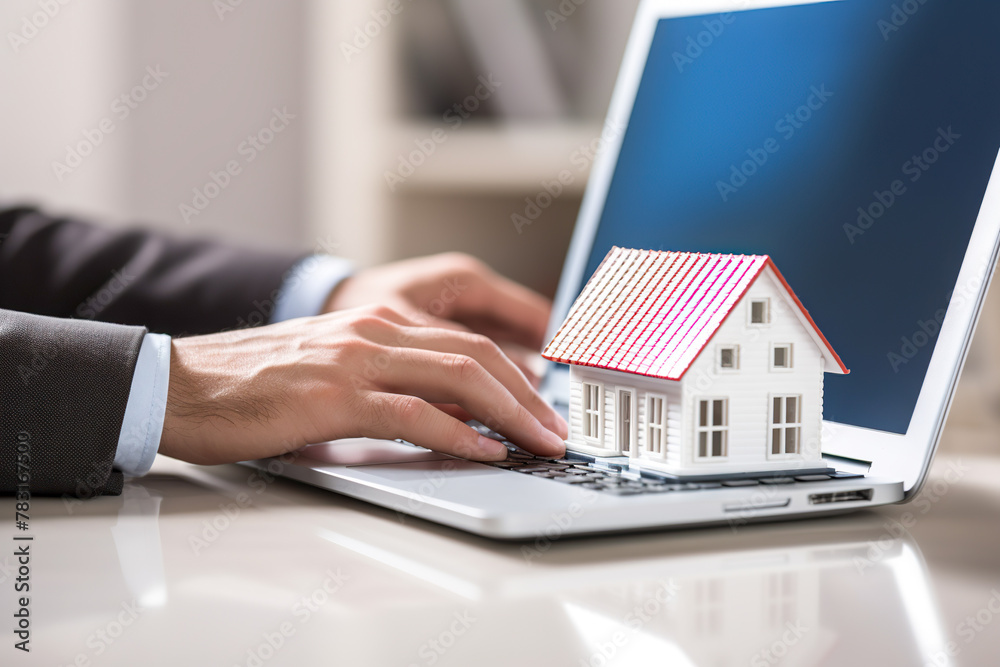 Fototapeta premium Man looking for house on real estate market website. Online mortgage and home loan concept