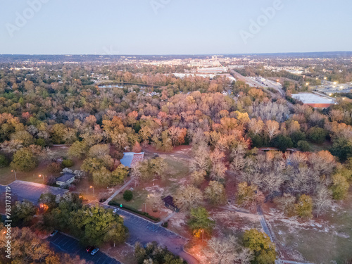 Aerial landscape of forest and pond at sunset in Augusta Georgia