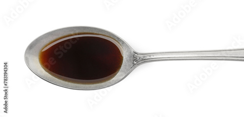 Tasty soy sauce in spoon isolated on white, top view