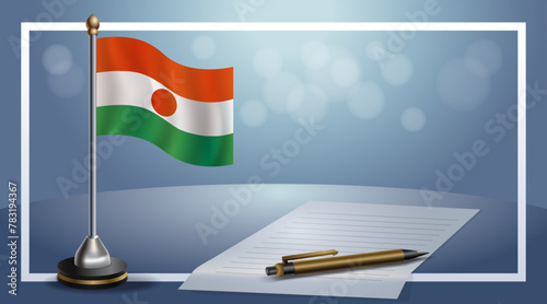 Small national flag of the Niger on bokeh background, vector Illustration