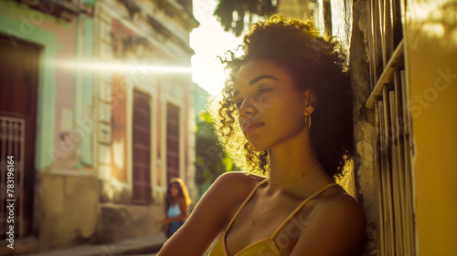 Vibrant portrait of a confident young woman in Cuba. Soft warm sunlight and colorful architecture.