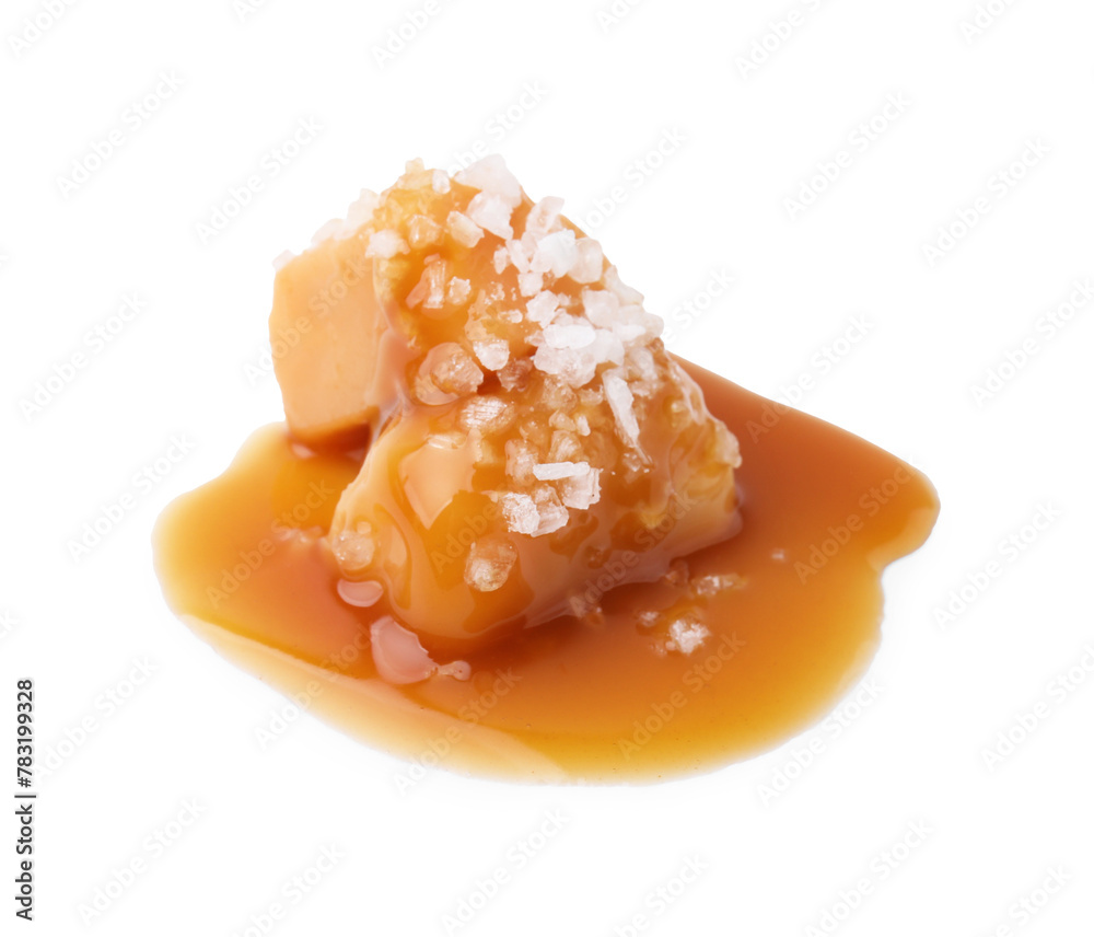 Yummy caramel candies and sea salt isolated on white Yummy caramel candies and sea salt isolated on white