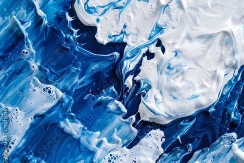 Abstract background of vivid blue and white color mixing with different tints creating uneven surface photo