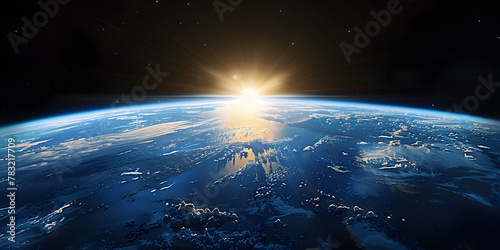 wide shot of the earth from space, blue horizon, black sky, bright sun in upper  photo