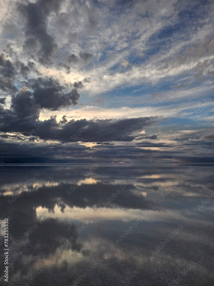 sunset over the Uyuni desert with salt