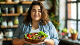 Happy confident overweight woman with salad bowl , Healthy food concept . starting diet .