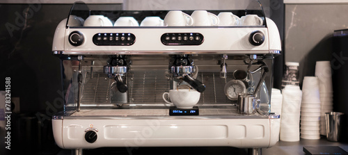 Sleek Modern Professional Coffee Machine Equipped for Barista Craft in a Contemporary Cafe Setting