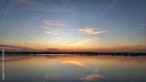 sunset over the lake © Lemon1