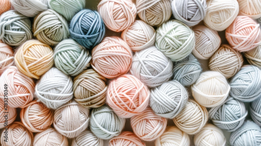 A pile of yarn balls sitting next to each other