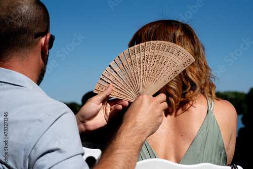 Summer moment with sun and fan photo