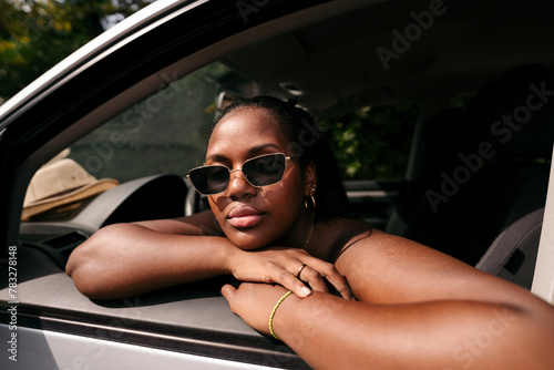 Black woman in a car