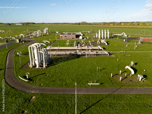 Controversial Gas Field in Groningen: Aerial View of Industrial Pipelines in Farmland photo