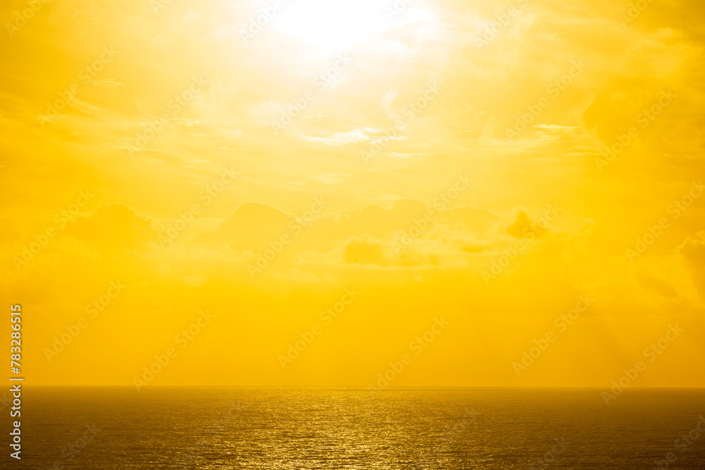 Sunlight over ocean, sea with clouds