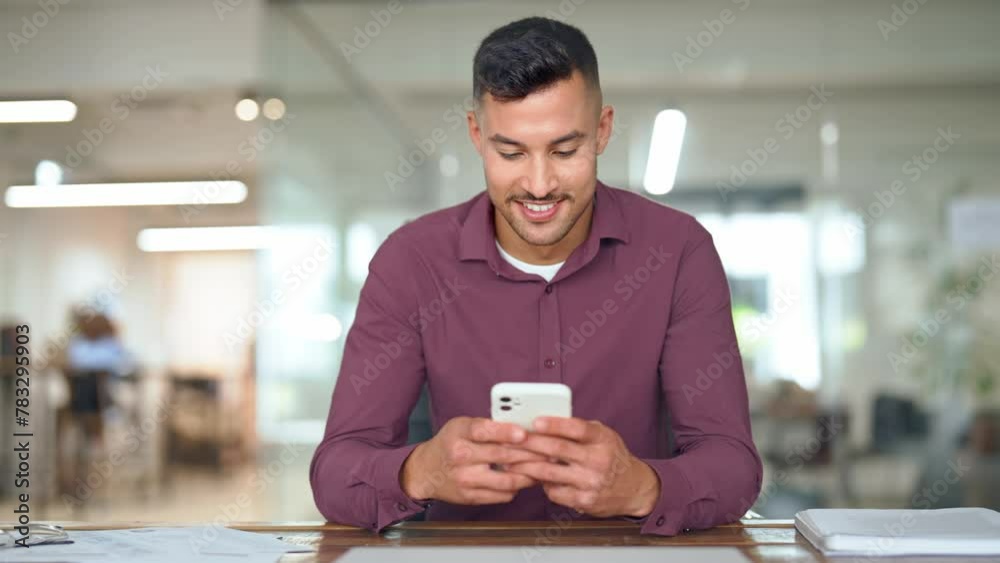 Busy latin businessman sitting in office using mobile phone at work. Young professional business man investor holding cellphone working on smartphone technology device making banking payments. Busy latin businessman sitting in office using mobile phone at work. Young professional business man investor holding cellphone working on smartphone technology device making banking payments.