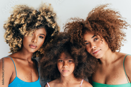 Beautiful family showcasing their natural curly afro hair