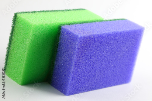 Two colored kitchen sponges for washing up