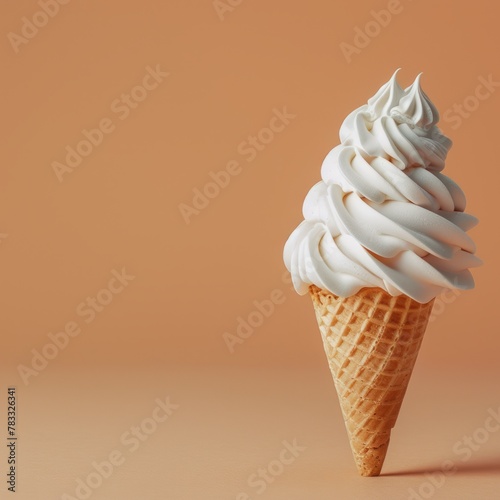 waffle cone with soft ice cream on a delicate peach background.  space for text, advertising