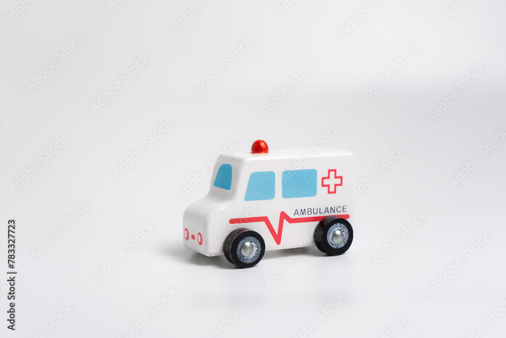 wooden ambulance toy car isolated on white background wooden ambulance toy car isolated on white background