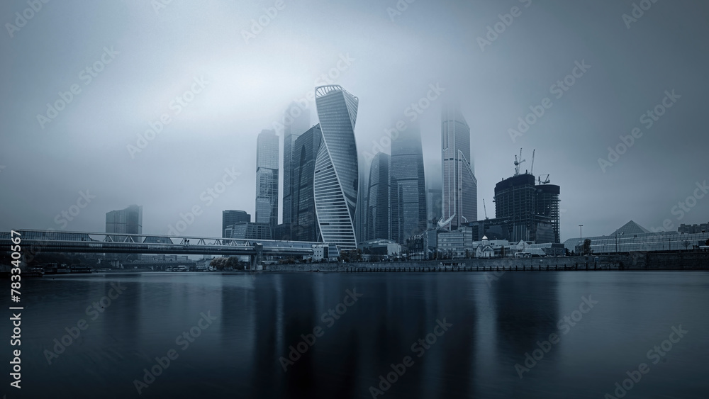 Moscow, Russia - November 3, 2020: Heights in the fog. Buildings of the business center Moscow City in a cityscape.