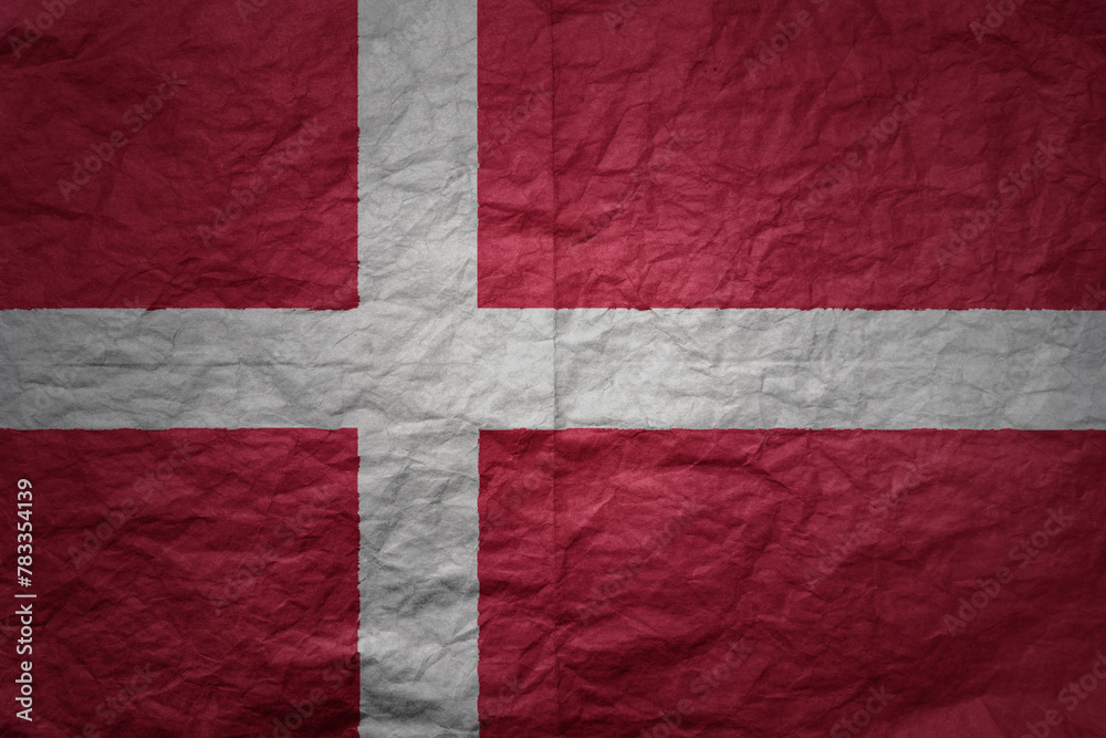 big national flag of denmark on a grunge old paper texture background big national flag of denmark on a grunge old paper texture background