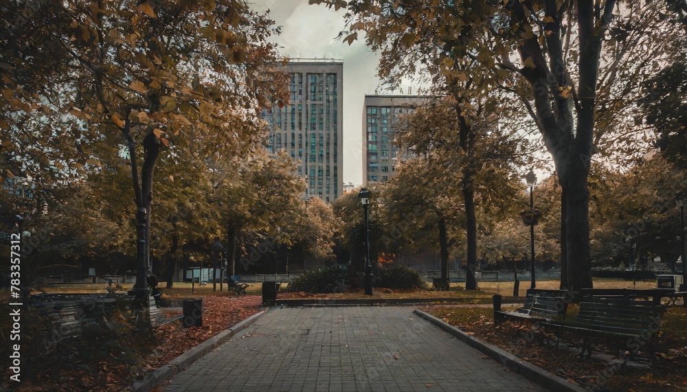 square in a park in autumn surrounded by office buildings