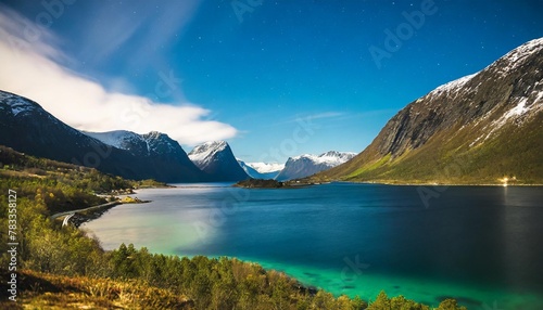 northen light under mountains beautiful natural landscape in the norway
