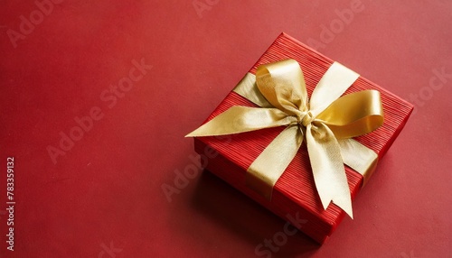 minimal product background for christmas new year and sale event concept red gift box with golden ribbon bow on red background 3d render illustration clipping path of each element included