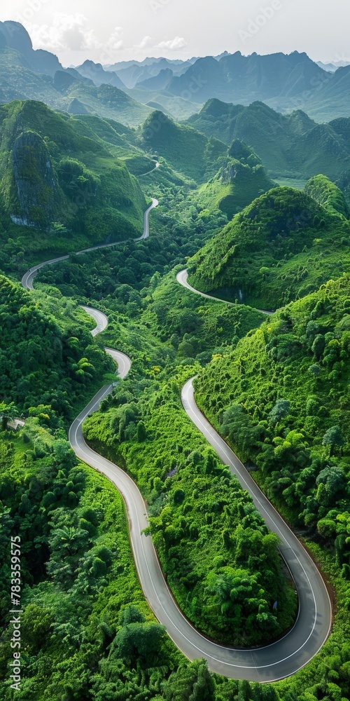 A winding road through lush green valley