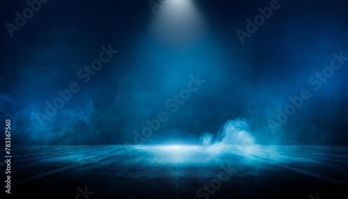 the dark stage shows dark blue background an empty dark scene neon light spotlights the asphalt floor and studio room with smoke float up the interior texture for display products