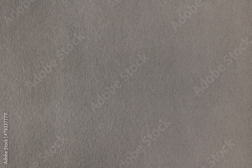 gray kraft paper textured background. texture of box paper. Paper Grey Background.