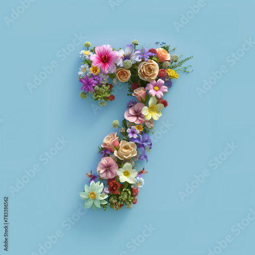 Colorful number seven made of various flowers isolated on pastel blue background. Spring theme. The date for the celebration, card, banner, copy space