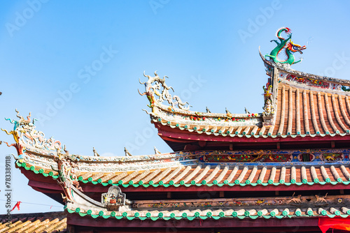 Roof sculpture of Tianhou Palace in Quanzhou, Fujian, China Ancient pagoda of Kaiyuan Temple in Quanzhou