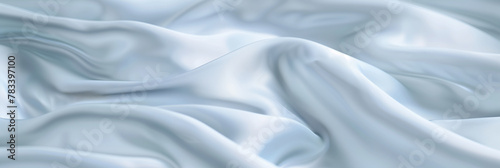 A white silk fabric with smooth and soft texture, floating in the air in a light blue background