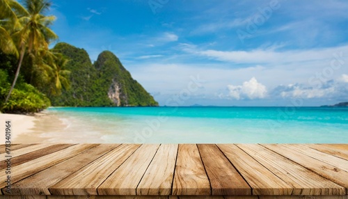 empty wooden table on blurred tropical sea and sky background