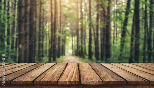 wooden board empty table in front of blurred background perspective brown wood over blur trees in forest can be used mock up for display or montage your products high quality photo