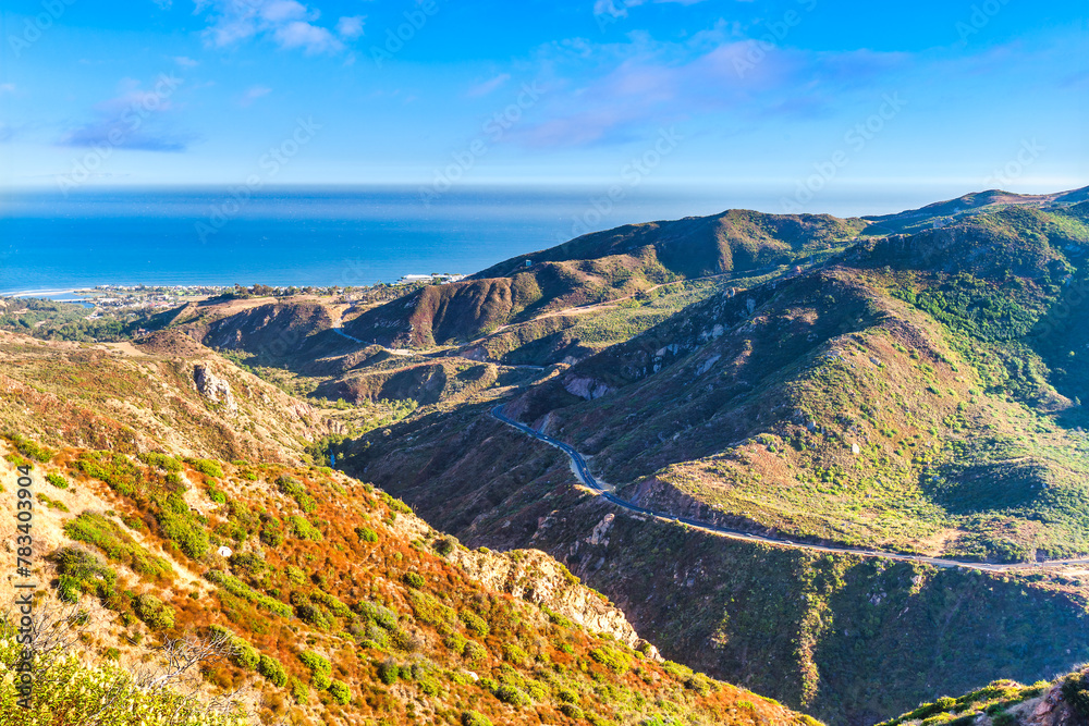 Aerial view of Malibu Canyon road. Malibu Canyon Road is a two-lane scenic route that connects US 101 near Calabasas to SR-1 in Malibu, California