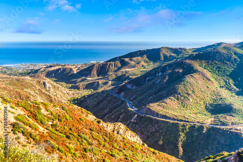 Aerial view of Malibu Canyon road. Malibu Canyon Road is a two-lane scenic route that connects US 101 near Calabasas to SR-1 in Malibu, California